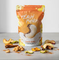 Pouch of 'Peach Punch' granola with ingredients on a light background