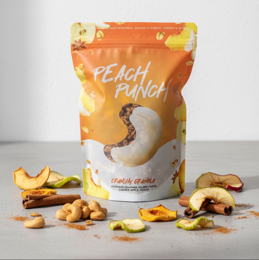 Pouch of 'Peach Punch' granola with ingredients on a light background